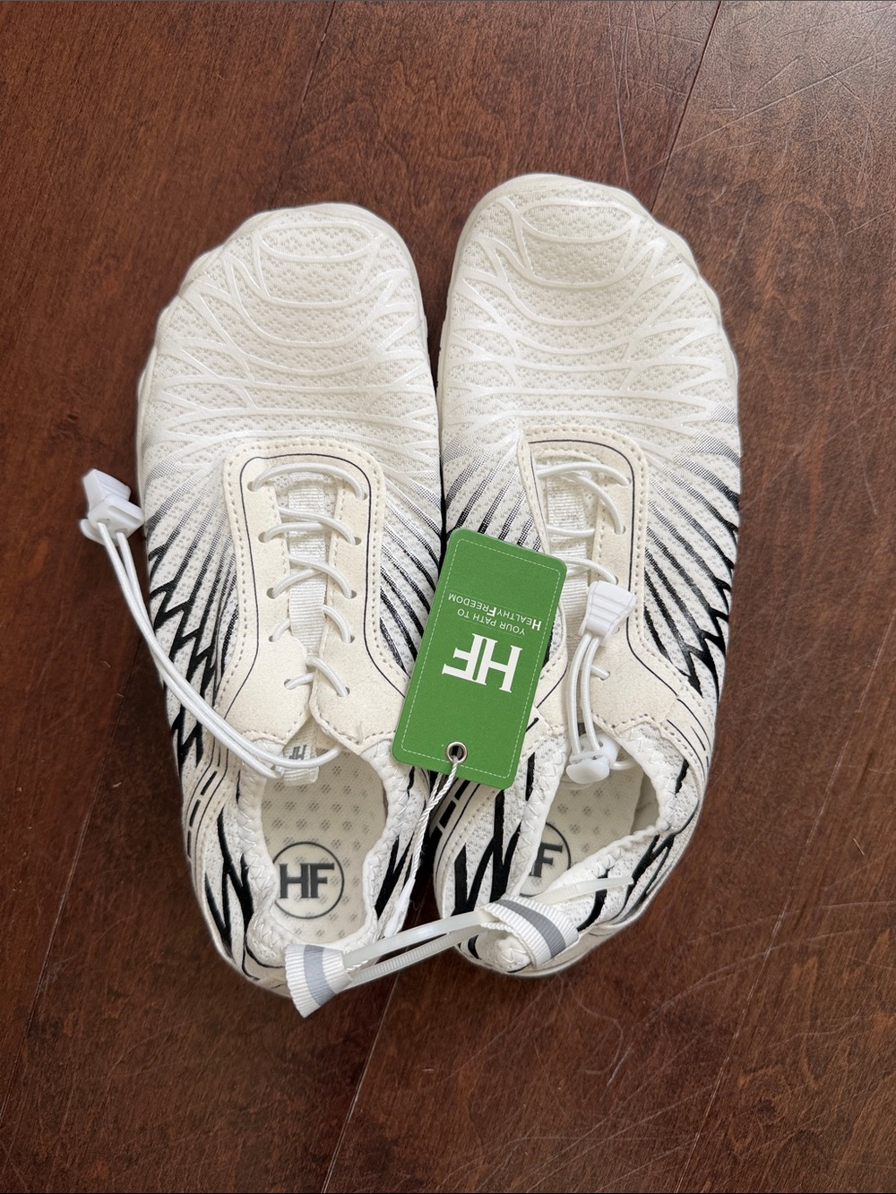 HF Women's White Athletic Shoes with Black Pattern